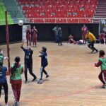 Players of KGS and PAF netball teams in action during National Inter School Girls Netball Championship Final at Liaqat Gymnasium