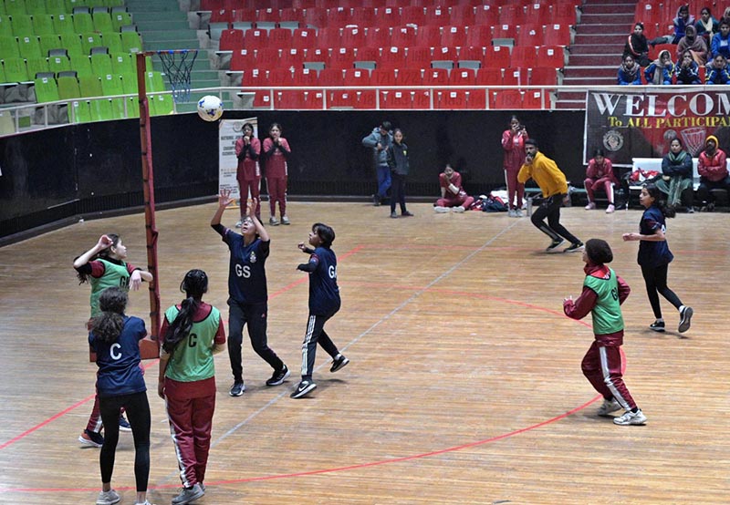 Players of KGS and PAF netball teams in action during National Inter School Girls Netball Championship Final at Liaqat Gymnasium