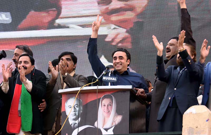 Chairman of Pakistan People's Party (PPP) Bilawal Zardari Bhutto waves his supporters during a public meeting at Liaquat Bagh