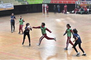 Players of KGS and PAF netball teams in action during National Inter School Girls Netball Championship Final at Liaqat Gymnasium