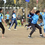 Players in action in handball match played between Mardan Board and Lahore Board teams during Pakistan Inter Board Girls Handball Championship at BISE Ground.