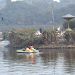 People enjoy boat ride in Gulshan-e-Iqbal Park