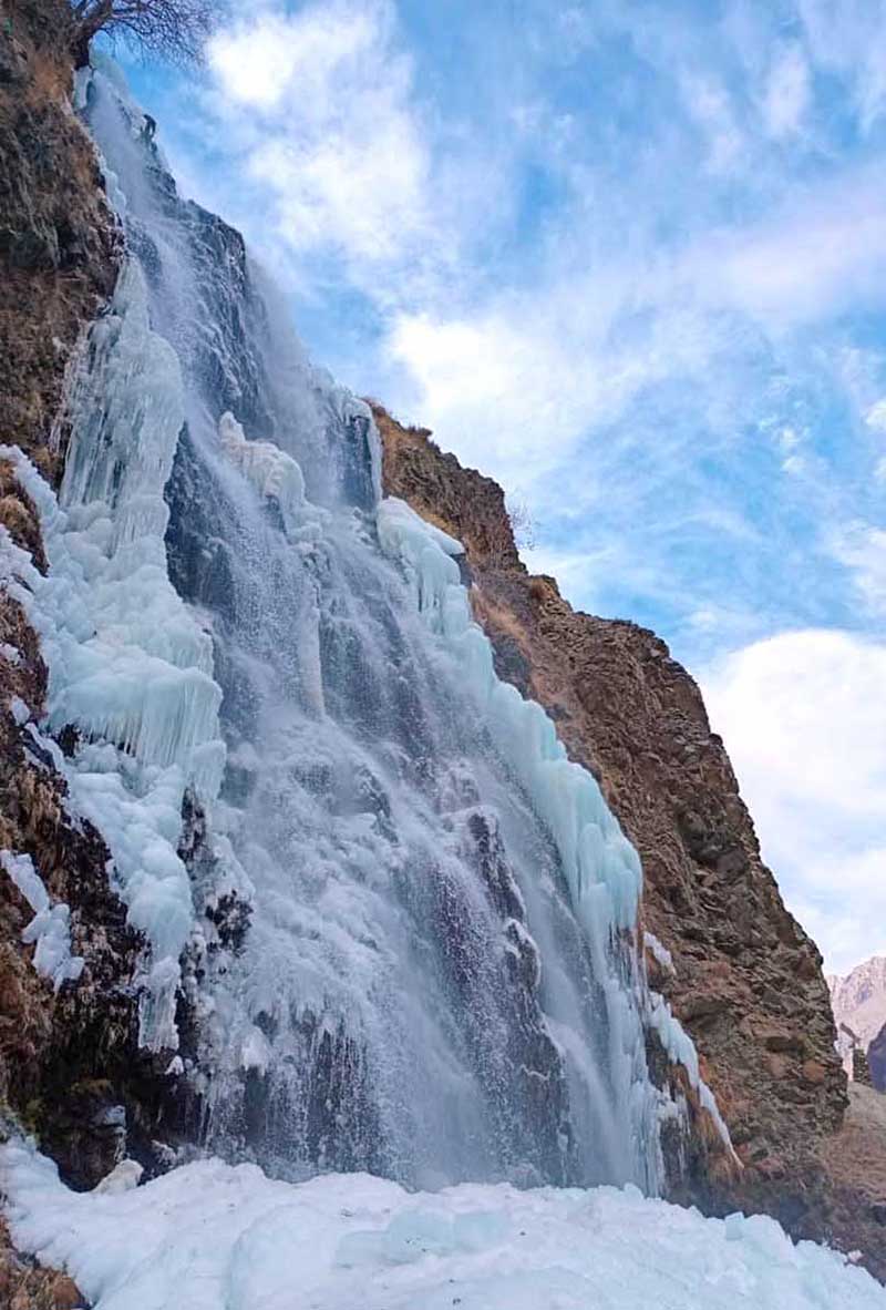 An attractive and eye catching view of freeze Manthoka Water Fall in the catchment area of Pakistan
