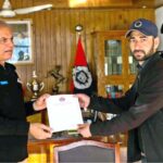 IGP Gilgit-Baltistan Afzal Mehmood Butt giving away certificate to Police personnel operation branch on his best duty.