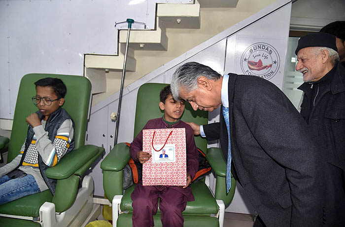 Murtaza Solangi, Caretaker Federal Minister for Information & Broadcasting distributing gifts to Thalassemia patients during the visit at Sundas foundation at Shadman
