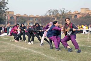 Students compete in tug-of-war competition during Sports Gala-2024 at The University of Faisalabad (TUF).