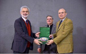 Mr.Justice Syed Mansoor Ali Shah presenting a copy of FJA Vision to Hon'ble Chief Justice of Pakistan, Mr Justice Qazi Faez Isa in the Conference on the Launch of Vision and E-Campus at the Federal Judicial Academy