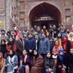 Professor NCA, Arshad Saeed in a group photograph with participants during Painting and Calligraphy Exhibition in collaboration with Formanite School System and Walled City Authority