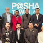 Caretaker Federal Minister for IT and Telecommunication Dr. Umar Saif in a group photo after Town Hall meeting