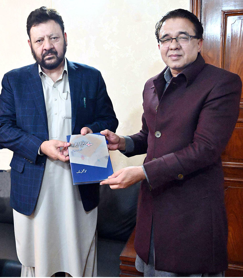 Principal Secretary to the President and renowned writer Muhammad Shakeel Malik presents his book ‘Bey-Ehtiatian’ to Chief Minister Gilgit-Baltistan, Gulbar Khan at GB House