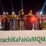 Muttahida Qaumi Movement-Pakistan (MQM-P) Convener Khaliq Maqbool Siddiqui and others waves to their supporters in election campaign rally at Bagh-e-Jinnah