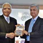 Rector UMT Asif Raza presenting souvenir to Caretaker Federal Minister for Information and Broadcasting Murtaza Solangi on the occasion of the Second International Media and Communication Conference