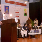 The Caretaker Federal Minister for Religious Affairs and Interfaith Harmony Aneeq Ahmed addressing 'Fasahat Ka Safar' book launching ceremony at Pakistan American Cultural Centre