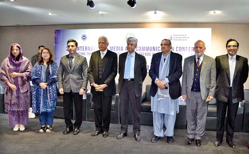 Caretaker Federal Minister for Information and Broadcasting Murtaza Solangi in a group photograph with the participants on the occasion of the 2nd International Media and Communication Conference at University of Management and Technology