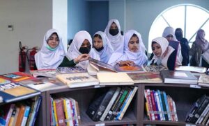 Students from different schools taking keen interest in books during visits to Garrison Public Library. 