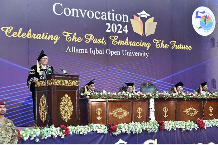 President Dr. Arif Alvi addressing the convocation of Allama Iqbal Open University (AIOU) at Jinnah Convention Centre.