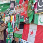 A vender display the different political party flags