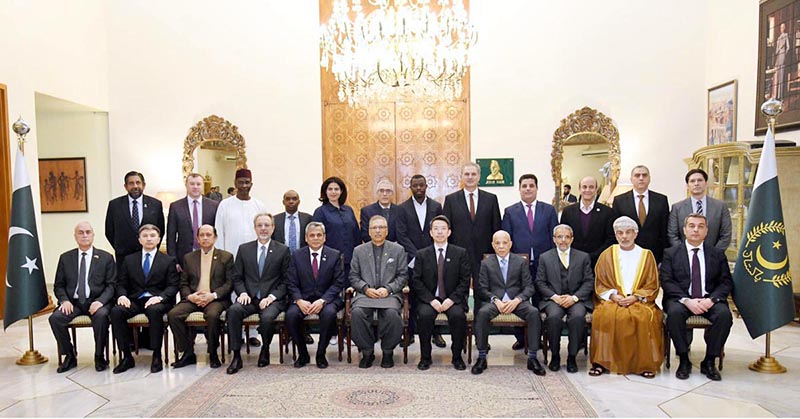 President Dr Arif Alvi in a group photo with officials and diplomats at the 29th anniversary celebration of the Commission on Science and Technology for Sustainable Development in the South (COMSATS), at Aiwan-e-Sadr