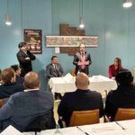 Caretaker Federal Minister for IT and Telecommunication Dr. Umar Saif addressing Pakistani professionals in Switzerland