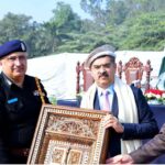 Governor Khyber Pakhtunkwa and IG KP present a souvenir to caretaker Prime Minister Anwaar-ul-Haq Kakar in the KP Police Darbar