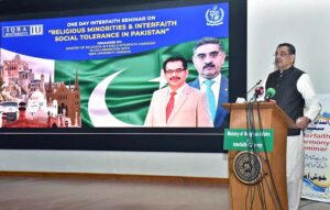 Caretaker Federal Minister of Religious Affairs & Inter faith Harmony Aneeq Ahmed addressing as seminar on Religious Minorities and Interfaith Social Tolerance in Pakistan at IQRA University.