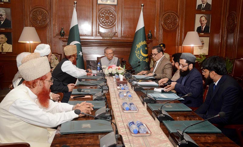 President Dr Arif Alvi chairing a meeting on the role of Masajid and Madaris in promoting education and creating awareness about health issues, at Governor House
