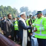 Caretaker Prime Minister Anwaar-ul-Haq Kakar interacts with KP Police officials after the Police Darbar Ceremony