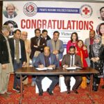 Patron-in-Chief of Private Nursing Colleges Federation Mahmood Sadiq Dhotar and President of Lahore Press Club Arshad Ansari are signing the Memorandum of Understanding (MOU) in the ceremony regarding the admission of children of journalists on scholarship in private Nursing Colleges
