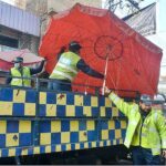 Traffic police officials removing encroachment during a drive launched on the instructions of Chief Traffic Officer Dr. Zahid ullah at Fawara Chowk.
