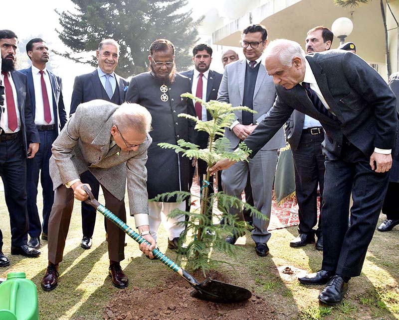 President Dr Arif Alvi planting a sapling during his visit to Federal Tax Ombudsman Office