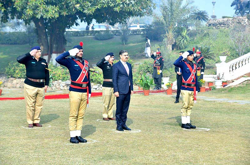 Caretaker Prime Minister Anwaar-ul-Haq Kakar being presented guard of honour by a contingent of KP Police