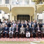 President Dr Arif Alvi in a group photo with the officials of the Federal Tax Ombudsman (FTO) during his visit to FTO Office