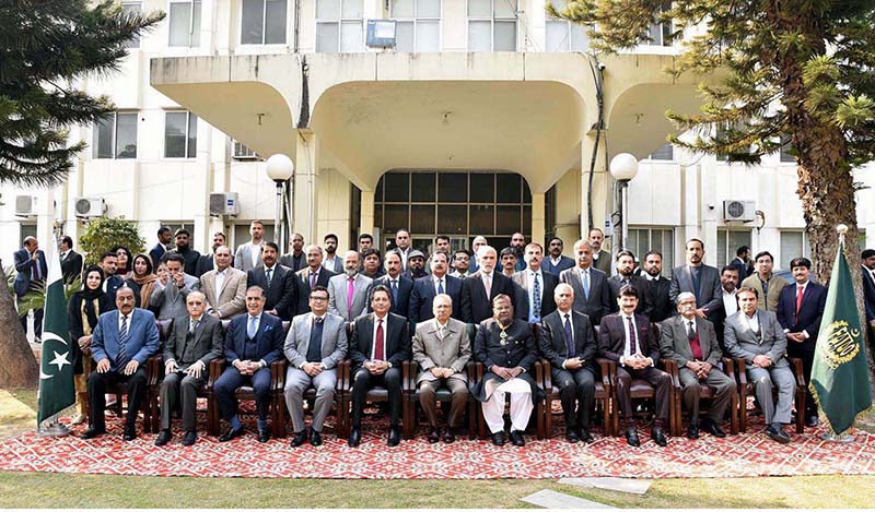 President Dr Arif Alvi in a group photo with the officials of the Federal Tax Ombudsman (FTO) during his visit to FTO Office