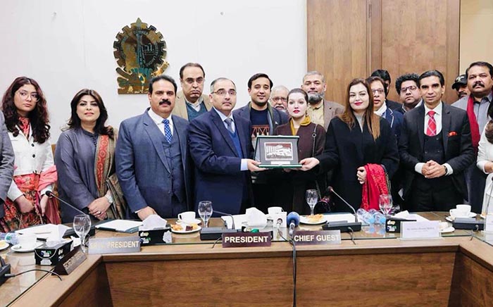 Special Assistant to Prime Minister for Human Rights and Women Empowerment Mushaal Hussein Mullick is being presented with a shield at Lahore Chamber of Commerce and Industry (LCCI).