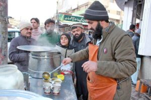 People taking soups which demand increased in cold weather in the Provincial Capital