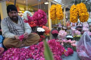 A vendor displays flower bouquets to attract the customers at Supper Market.
