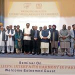 Caretaker Federal Minister of Religious Affairs & Interfaith Harmony Aneeq Ahmed in a group photograph during seminar on "Bridging Belief: Interfaith harmony in Pakistan" at Dawood University of Engineering and Technology
