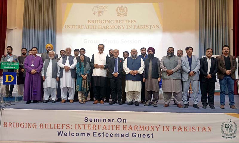 Caretaker Federal Minister of Religious Affairs & Interfaith Harmony Aneeq Ahmed in a group photograph during seminar on "Bridging Belief: Interfaith harmony in Pakistan" at Dawood University of Engineering and Technology