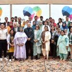 President Dr. Arif Alvi and the First Lady Begum Samina Arif Alvi in a group photo with organizers and staff at Society for Children in Need Of Special Attention (SCINOSA)