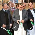 Caretaker Federal Minister for National Heritage and Culture Division Jamal Shah cutting ribbon to inaugurate calligraphic exhibition titled "Mashq-e-Ishq" by Gen. (R) Humayun Khan Bangash at PNCA