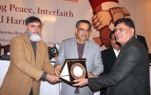 Federal Minister for Religious Affairs and Interfaith Harmony, Aneeq Ahmed addressing a seminar titled Promoting Peace, Interfaith and Social Harmony.