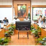 Special Representative to the Prime Minister for Religious Harmony & Islamic Countries and Chairman Pakistan Ullema Council, Hafiz Tahir Mahmood Ashrafi is being briefed while visiting National Emergency Operations Centre.