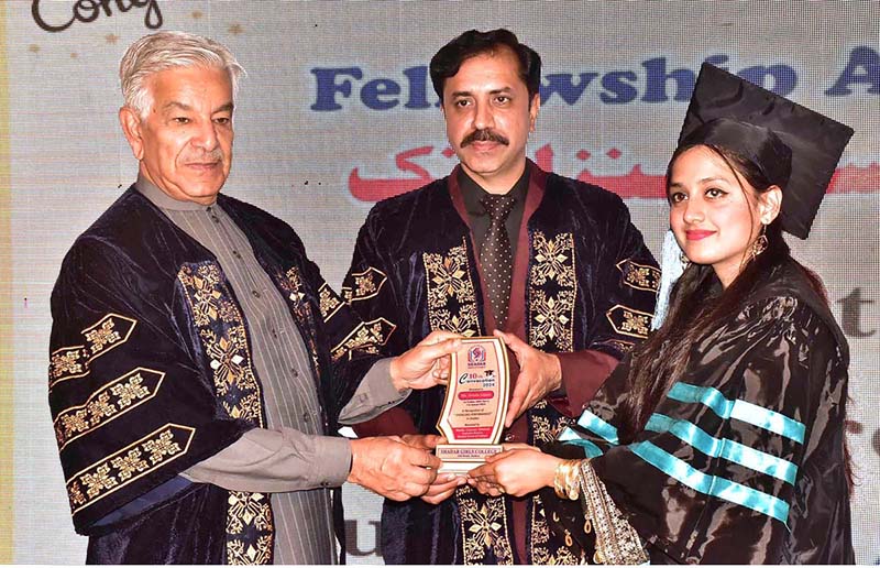 PML-N leader Khawaja Muhammad Asif distributing certificates and shields among students eve on the 10th Convocation Ceremony of Shadab Girls College