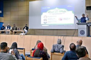 Caretaker Federal Minister of Religious Affairs & Interfaith Harmony, Aneeq Ahmed addressing during Conference on Sirat-un-Nabi (SAW) and Contemporary Challenges and their solution at Iqra University