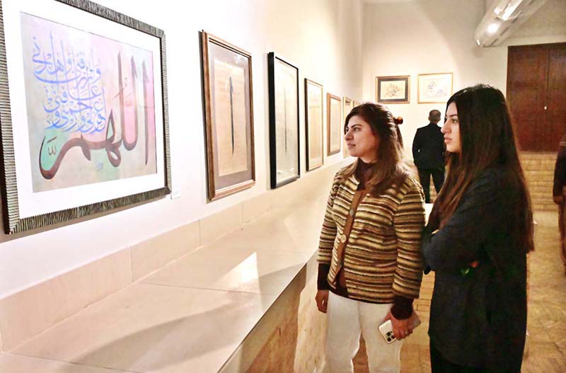 Caretaker Federal Minister for National Heritage and Culture Division Jamal Shah cutting ribbon to inaugurate calligraphic exhibition titled "Mashq-e-Ishq" by Gen. (R) Humayun Khan Bangash at PNCA