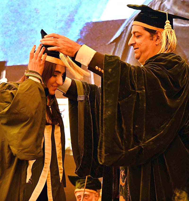 Caretaker minister for Tourism and Environment Arshad Wali Muhammad confers Gold Medal to a graduate during the 12th Convocation of Sindh Agriculture University Tandojam
