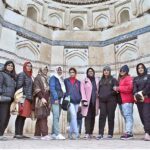 Visitors enjoying the view of world heritage site of Uch Sharif. The Tomb of Bibi Jawindi is one of the five monuments in Uch Sharif that are on the tentative list of the UNESCO World Heritage Sites. Dating back to the 15th century, the shrine was built in the spirit of the historical Sufi premier Bibi Jawindi of the Suhrawardiyyah order, a strictly hegemonistic Sunni school of theosophical thought which puts particular emphasis on the Shafi’i school of classical jurisprudence in the context of its interpretation of the Sharia. Jaw Indo was great-granddaughter to Jahaniyan Jahangasht, a famous Sufi saint in his own right
