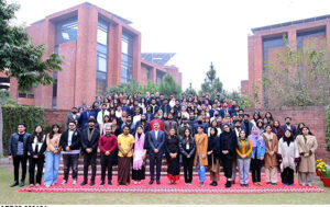 Students of BNU present Caretaker Prime Minister Anwaar-ul-Haq Kakar with a painting as a souvenir.