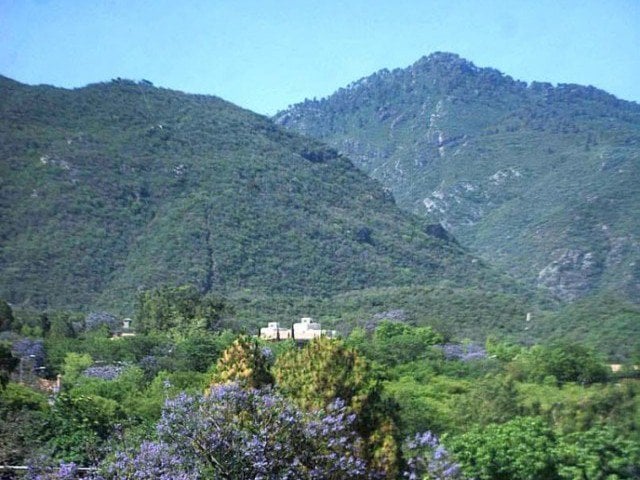 Snow-clad valley in Northern areas, majestic Margalla hills of Islamabad attracts tourists after rain