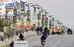  A view of banners of candidates on the street lights at 6th Road in connection with upcoming General Elections-2024. 